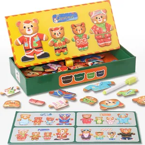 Magnetic wooden bear dress-up puzzle set with various outfits in a storage box