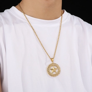 Detail of 18K gold plated hiphop star pendant with celtic knot on twisted rope chain