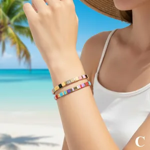 Bohemian Tila bead stretch bracelets shown on a wrist with a sunny beach background