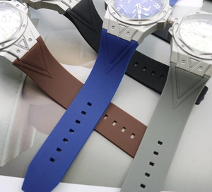 Close-up of silicone sport watch straps with triangle texture in multiple colors