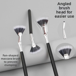 Angled fan eyelash brush set with black and white gradient bristles and matte black handle