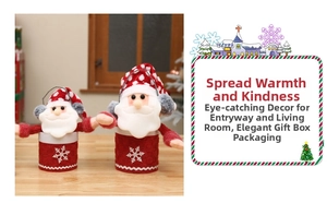 Detail of red and white velvet Santa themed gift boxes with festive snowflake patterns