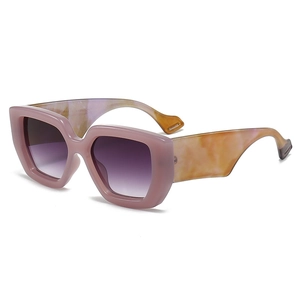 Chic oversized square sunglasses with pink frame and marble temples on white background