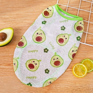 Close-up of breathable mesh pet vest with cute avocado print and green piping details