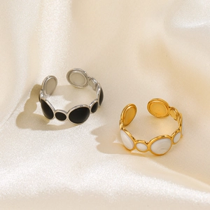 Adjustable geometric stainless steel ring with black and white enamel in gold and silver plating