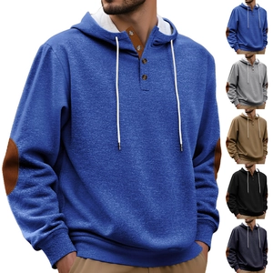Detail view of colorful men's hoodies showing button necklines and contrast elbow patches