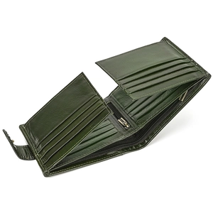 Detail view of green genuine leather trifold wallet with card slots and zipper coin pocket