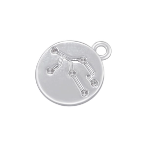 Macro detail of silver constellation pendant with inlaid sparkling cubic zirconia stones