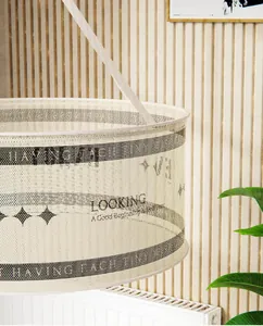 Detail of breathable drying basket mesh with decorative black lettering for laundry
