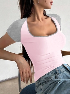 Detail of slim fit Y2K T-shirt with U-neck design and contrast pink and grey colors
