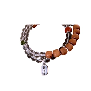 S925 silver white crystal and wood bead bracelet featuring a silver prosperity charm
