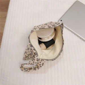 Floral cotton pouch with zipper and wristlet for cosmetics and small accessories