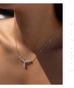 Elegant S925 sterling silver flower Y-necklace with crystal accents on a model