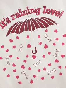 Detail of white mesh pet t-shirt with heart, bone prints and it's raining love text