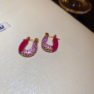 J-shaped gold-plated earrings with vibrant magenta enamel and pink zirconia stones