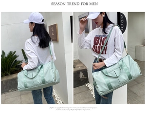 Close-up of mint green travel bag with dry-wet separation and detachable shoulder strap