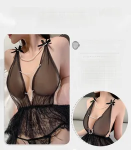 Detail of sexy black mesh bodysuit featuring delicate lace and layered faux pearl chains