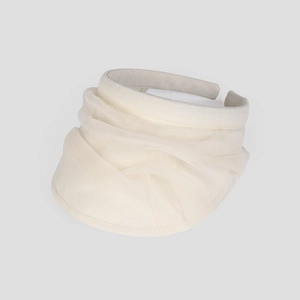 Close-up of elegant cream organza sun hat with pleated chiffon detailing for women
