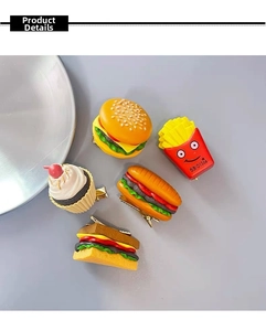 Detailed close-up of 5-piece realistic resin food hair clips featuring hamburger and fries