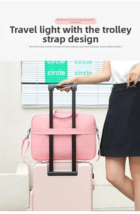 Pink laptop case featuring a wide luggage strap for easy travel attachment on suitcase