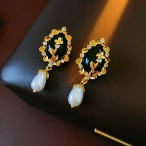 Vintage gold floral earrings with black stone and waterdrop pearl pendant detail