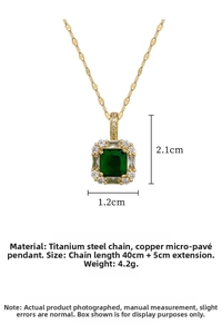 Macro view of titanium steel necklace with green square gem and white zircon inlay details