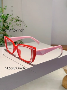 Detail view of red and pink contrast frame glasses with 14.5cm width measurement