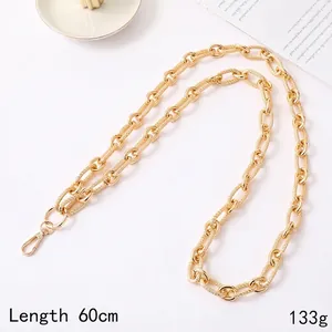 Detailed view of 60cm gold metal chain strap with lobster clasps for crossbody bags