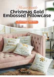Detailed view of white Christmas pillow cover with gold foil reindeer and snowflake prints