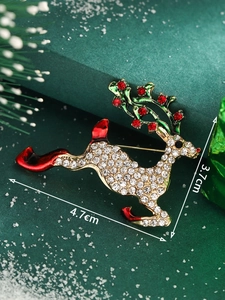 Detail view showing dimensions of a rhinestone reindeer brooch with enamel accents