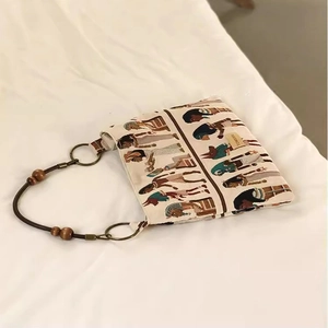 Vintage Egyptian jacquard canvas tote bag with leather handles and decorative wood beads