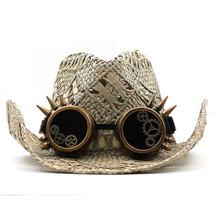Steampunk straw cowboy hat with bronze gear goggles and metal spikes on white background