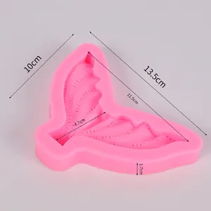 Detail view of pink mermaid tail silicone mold with dimensions 13.5x10cm and scale texture