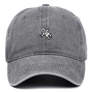 Close-up of the vintage washed dark grey cotton baseball cap with astronaut embroidery detail
