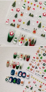 Detail showing 3D embossed Christmas nail stickers with Santa Claus and reindeer designs
