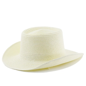 Detail of cream straw sun hat showing fine woven fiber texture and curved brim edge