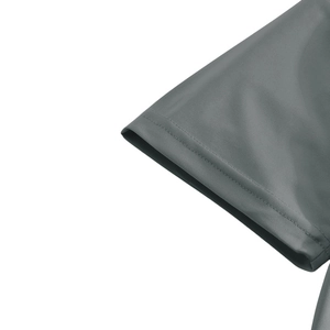 Detailed macro view of grey polo shirt sleeve with breathable mesh texture and double stitching