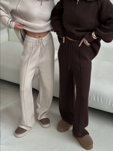 Women's autumn knit two-piece set featuring half-zip pullover and wide-leg lounge pants