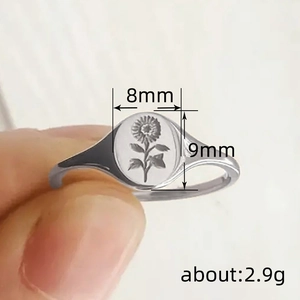 Minimalist silver sunflower signet ring with oval engraved floral pattern for women and men