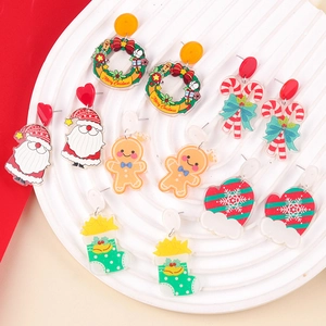 Colorful acrylic Christmas earrings set featuring Santa, candy cane, and gingerbread man