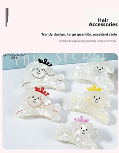 Detailed view of colorful crown poodle hair claws with pearlescent marble texture