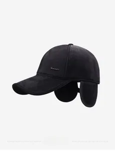 Detail view of winter baseball cap with ear flaps and Donatello metal logo ornament