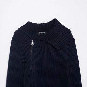 Women's navy blue ribbed knit cardigan featuring asymmetrical metal zip and wide collar