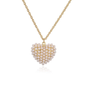Collier chaîne torsadée dorée avec pendentif cœur orné de perles blanches chic