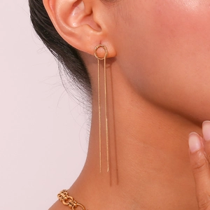 Elegantly draped 18K gold-plated long tassel snake chain earrings worn by a model