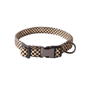 Laser checkered dog collar with black and gold patterns and a premium metal buckle