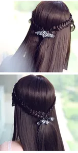 Detail of floral alloy spring hair clip with rhinestones shown on braided hair