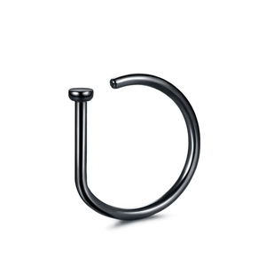Close-up of black metal C-shaped nose ring with smooth finish on white background