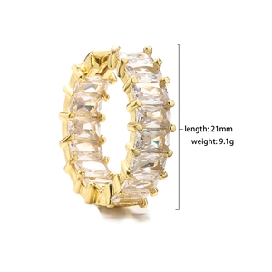Macro view of 21mm eternity band ring with baguette cut zircon and 18K gold plating