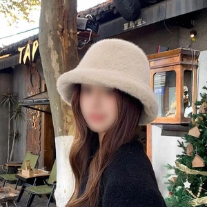 Beige plush faux fur fisherman hat for winter warmth and trendy outdoor fashion look